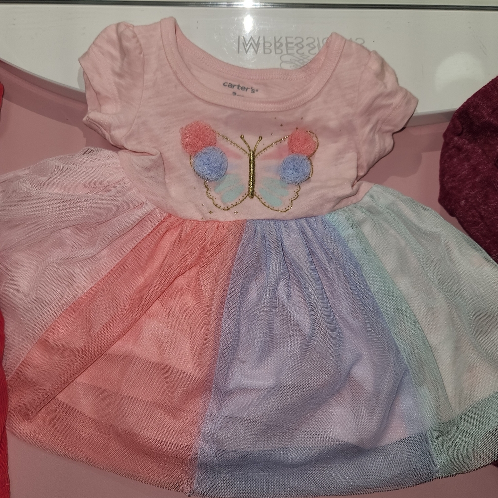 Baby girl dresses and a cardigan